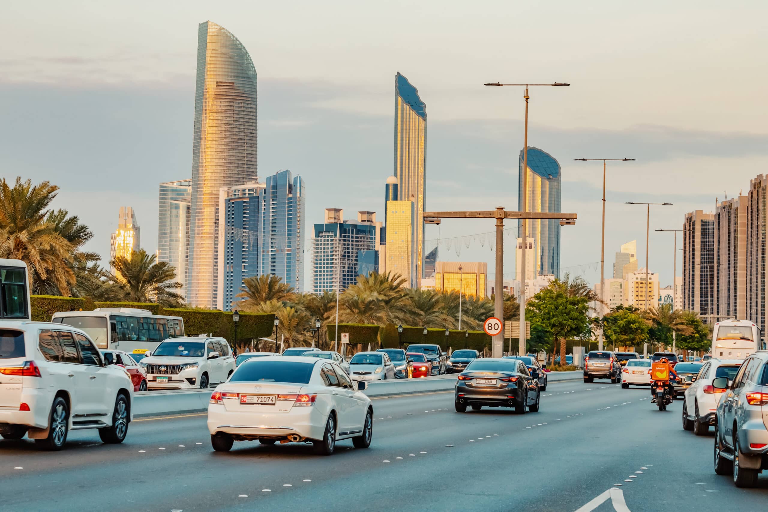 15 january 2023 abu dhabi uae view wide street with busy car traffic skyscrapers with hotels residential real estate blocks scaled