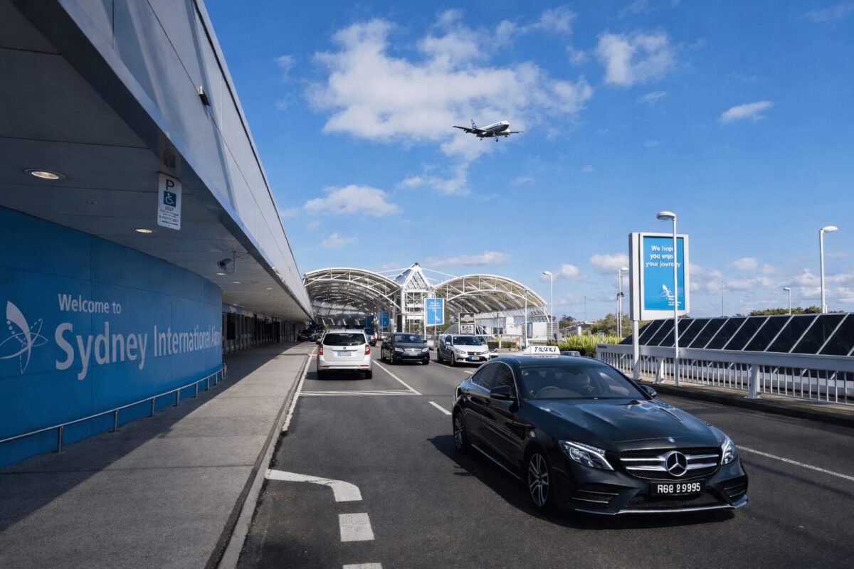 Sydney Kingsford Smith Airport 5 VEhicles in front of Sydney Kingsford Smith Airport
